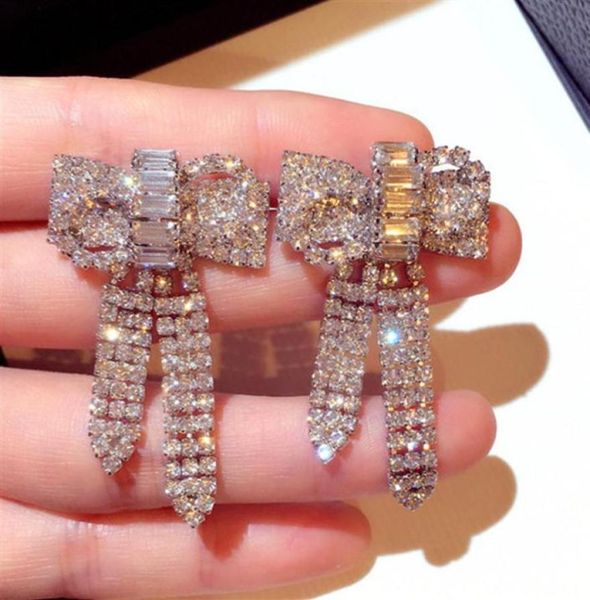 new korean style ins fashion luxury designer super glittering diamonds zircon cute lovely bow stud earrings for woman girls264g6478695, Golden;silver
new korean style ins fashion luxury designer super glittering diamonds zircon cute lovely bow stud earrings for woman girls264g6478695, Golden;silver