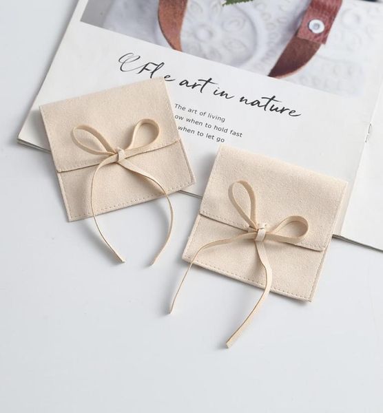 beige microfiber suede jewelry small envelope bag with rope packaging pouch wedding gift party bags6995844, Pink;blue
beige microfiber suede jewelry small envelope bag with rope packaging pouch wedding gift party bags6995844, Pink;blue