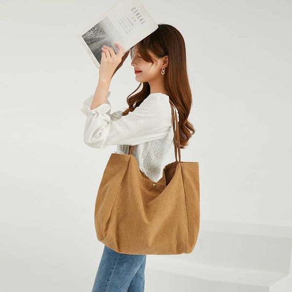 women's bag new commuter fashion canvas shoulder bag large capacity and small design sense tote bag
women's bag new commuter fashion canvas shoulder bag large capacity and small design sense tote bag