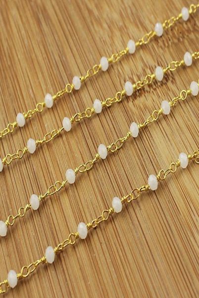 whole moonstone chalcedony rosary style beaded chain4x3mm faceted rondelles white beads wire wrapped gold chain beaded c46448463451, Silver 
whole moonstone chalcedony rosary style beaded chain4x3mm faceted rondelles white beads wire wrapped gold chain beaded c46448463451, Silver