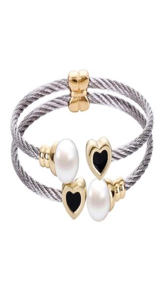 chran silver plated round shell pearl wrist bracelets for women unique 2 rows stainless steel cable bangle6053974, Black
chran silver plated round shell pearl wrist bracelets for women unique 2 rows stainless steel cable bangle6053974, Black