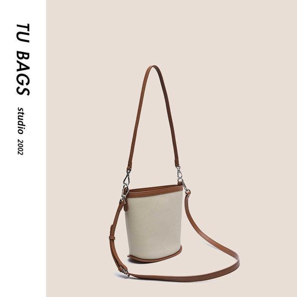 small bucket bag new layer cowhide women's bag with a high-end feel niche single shoulder crossbody portable commuting tote bag
small bucket bag new layer cowhide women's bag with a high-end feel niche single shoulder crossbody portable commuting tote bag