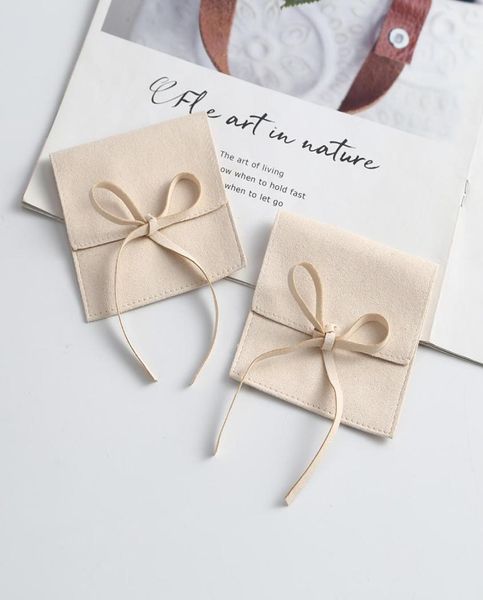 beige microfiber suede jewelry small envelope bag with rope packaging pouch wedding gift party bags4382666, Pink;blue
beige microfiber suede jewelry small envelope bag with rope packaging pouch wedding gift party bags4382666, Pink;blue