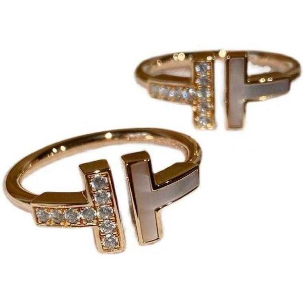 original new tiffay double ring 925 sterling silver plated 18k gold ti half diamond set white shell open fritillaria 9j0o
original new tiffay double ring 925 sterling silver plated 18k gold ti half diamond set white shell open fritillaria 9j0o
