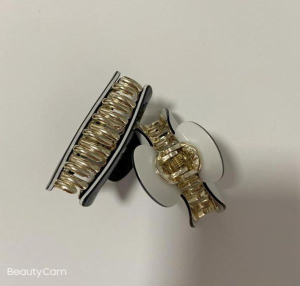 fashion black and white acrylic claw clips hairpin side clip popular head accessories in european and american countries67940704047990, Golden;silver
fashion black and white acrylic claw clips hairpin side clip popular head accessories in european and american countries67940704047990, Golden;silver