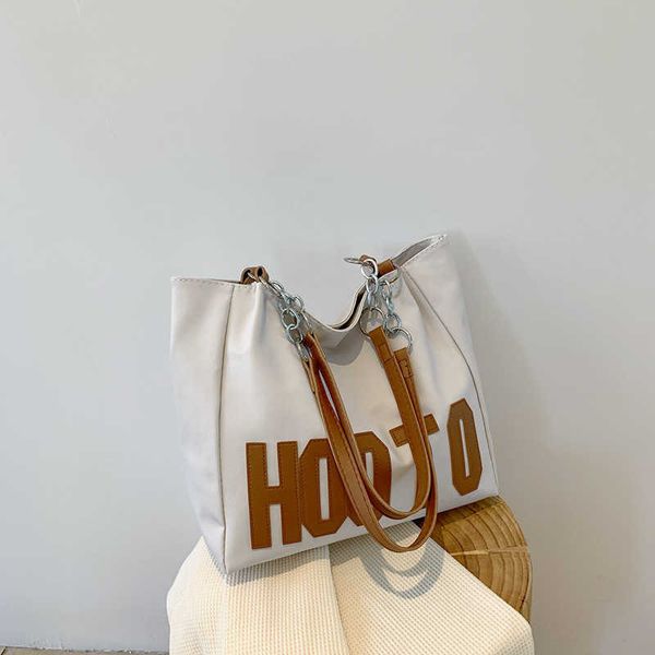 tote high capacity canvas bag for women's autumn new class college students small group design one shoulder carrying bag
tote high capacity canvas bag for women's autumn new class college students small group design one shoulder carrying bag