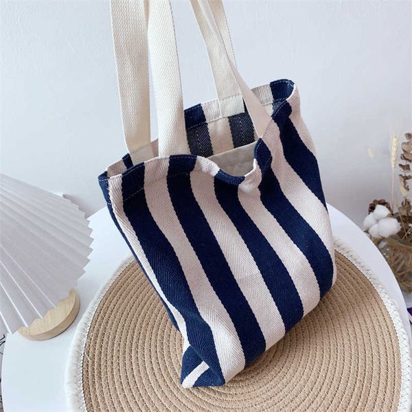 small group striped fabric single shoulder tote bag versatile simple casual large capacity artistic style and high aesthetic value
small group striped fabric single shoulder tote bag versatile simple casual large capacity artistic style and high aesthetic value