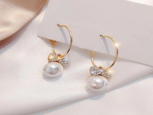 fashion korean elegant crystal bowknot imitation pearl hoop earrings for women exquisite rhinestone earring3604889, Golden;silver
fashion korean elegant crystal bowknot imitation pearl hoop earrings for women exquisite rhinestone earring3604889, Golden;silver