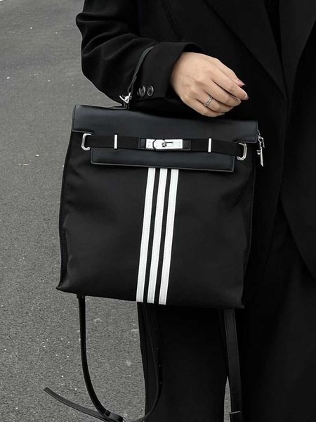 summer new stripe handheld tote bag backpack fashion canvas bag small bag junior backpack high sense
summer new stripe handheld tote bag backpack fashion canvas bag small bag junior backpack high sense