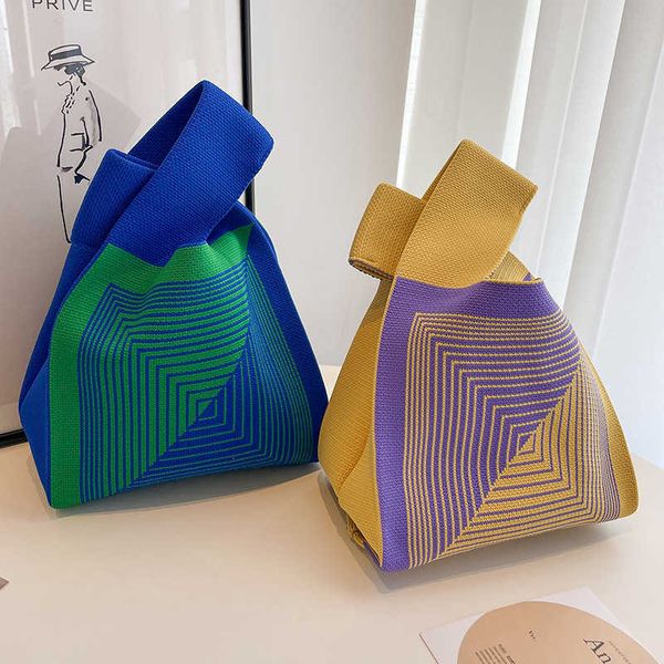 new textured knitted bag women's spring/summer handheld bag striped weaving handheld tote bag small and large capacity bag
new textured knitted bag women's spring/summer handheld bag striped weaving handheld tote bag small and large capacity bag