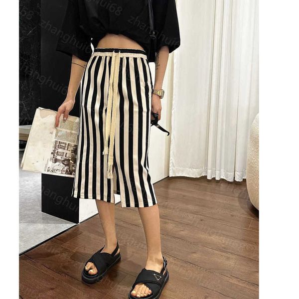 23ss womens designer clothing designer skirts triangular embroidery lettering vertical slit half skirt women clothes a1, Black
23ss womens designer clothing designer skirts triangular embroidery lettering vertical slit half skirt women clothes a1, Black