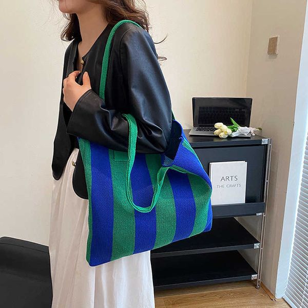 designer tote new japanese and niche texture handbag with striped woven tote bag large capacity underarm bag women's bag one shoulder c
designer tote new japanese and niche texture handbag with striped woven tote bag large capacity underarm bag women's bag one shoulder c