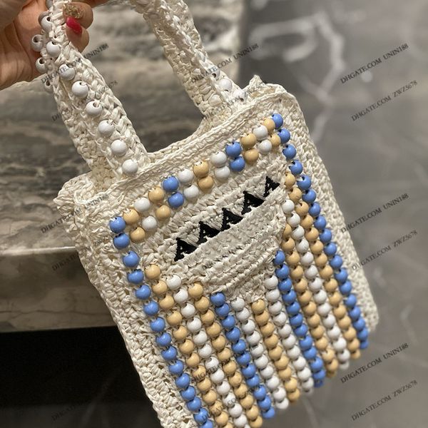 23ss womens luxurys designers tote bag flowers summer straw with colored wooden balls shoulder strap crossbody women handbag with original m
23ss womens luxurys designers tote bag flowers summer straw with colored wooden balls shoulder strap crossbody women handbag with original m