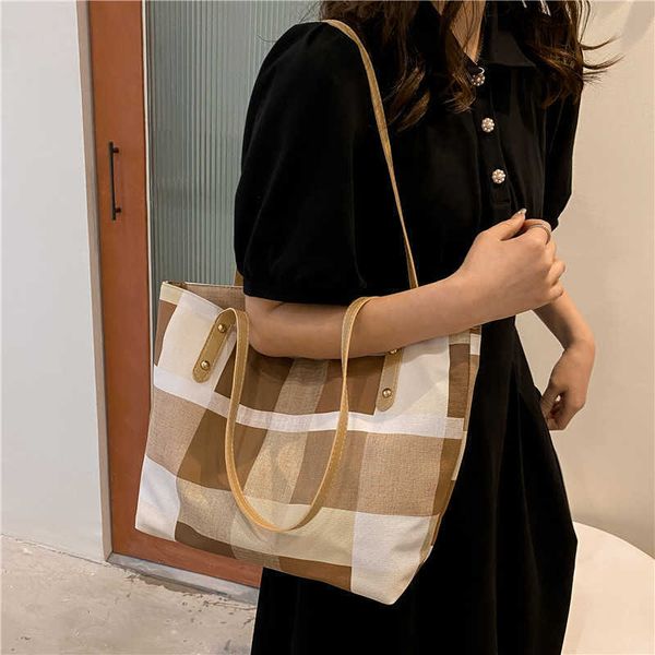 canvas bag women's new tote bag niche commuting grid college student class large capacity shoulder bag
canvas bag women's new tote bag niche commuting grid college student class large capacity shoulder bag