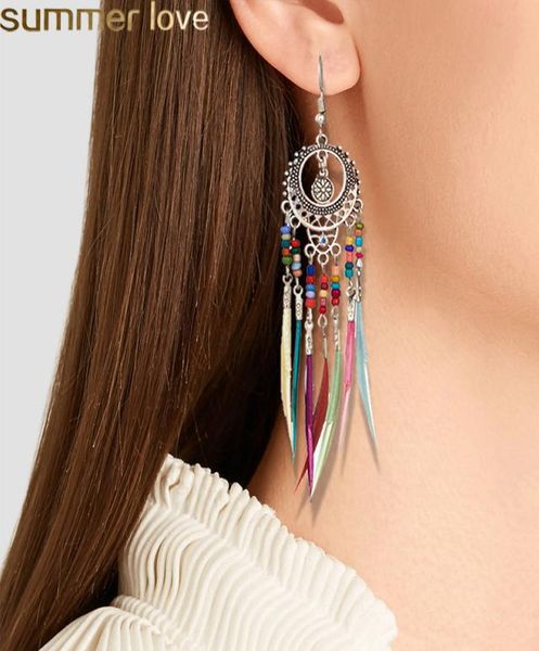 new fashion vintage ethnic feather dangle earrings bohemia rainbow colors seed bead personalized tassel earring for women jewelry 4569500, Silver
new fashion vintage ethnic feather dangle earrings bohemia rainbow colors seed bead personalized tassel earring for women jewelry 4569500, Silver