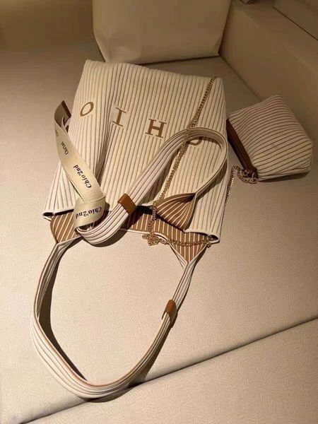 designer tote nanfeng louver pit strip tote bag large capacity bag women's summer leisure niche design single shoulder bag factory good
designer tote nanfeng louver pit strip tote bag large capacity bag women's summer leisure niche design single shoulder bag factory good