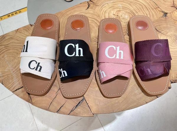 women designer sandals luxury summer woody for mules flat slides light tan beige white black pink lace lettering fabric canvas slippers wome
women designer sandals luxury summer woody for mules flat slides light tan beige white black pink lace lettering fabric canvas slippers wome