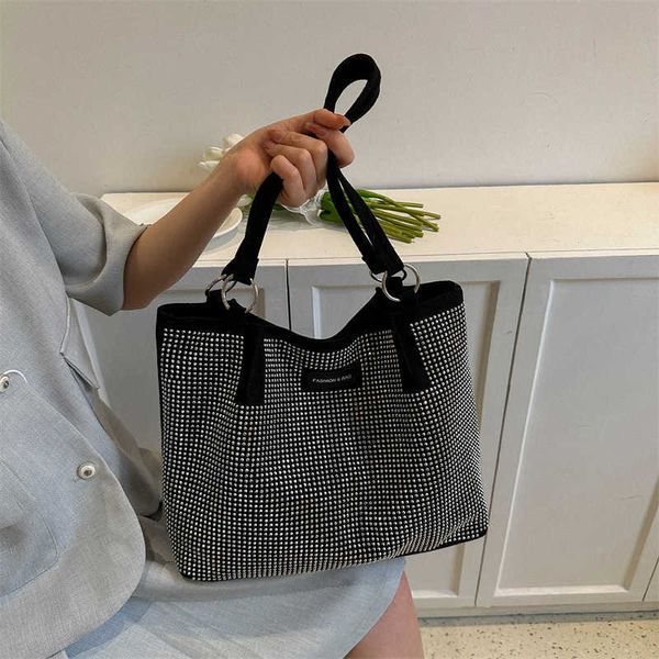 designer tote large-capacity bag women's bag new spring high-class commuter bag casual
designer tote large-capacity bag women's bag new spring high-class commuter bag casual