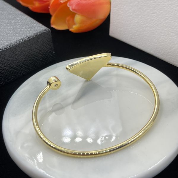 white black gold bangle bracelet with triangle letter decoration fashion bracelet rock hip hop youth commuter matching party
white black gold bangle bracelet with triangle letter decoration fashion bracelet rock hip hop youth commuter matching party