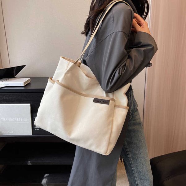 lazy style large capacity canvas bag for women's new summer color contrast handbag niche ins one shoulder tote bag
lazy style large capacity canvas bag for women's new summer color contrast handbag niche ins one shoulder tote bag