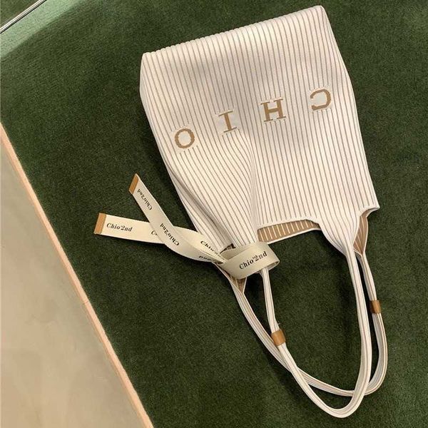 nanfeng louver pit strip tote bag large capacity bag women's summer leisure niche design single shoulder bag factory goods
nanfeng louver pit strip tote bag large capacity bag women's summer leisure niche design single shoulder bag factory goods