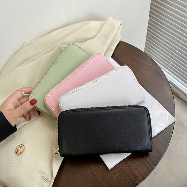 new zipper handbag women's long large capacity women's purse solid color texture card bag can be used as a gift 
new zipper handbag women's long large capacity women's purse solid color texture card bag can be used as a gift