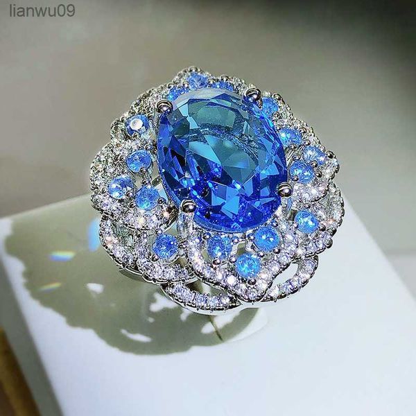 sparkling blue zircon large flower ring female 925 silver fashion wedding party proposal jewelry gift l230704, Golden;silver
sparkling blue zircon large flower ring female 925 silver fashion wedding party proposal jewelry gift l230704, Golden;silver