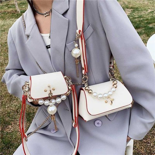 shoulder bags mini crossbody for women metal chain pearl clutches fashion small handbags ladys bolsa feminina 230426
shoulder bags mini crossbody for women metal chain pearl clutches fashion small handbags ladys bolsa feminina 230426