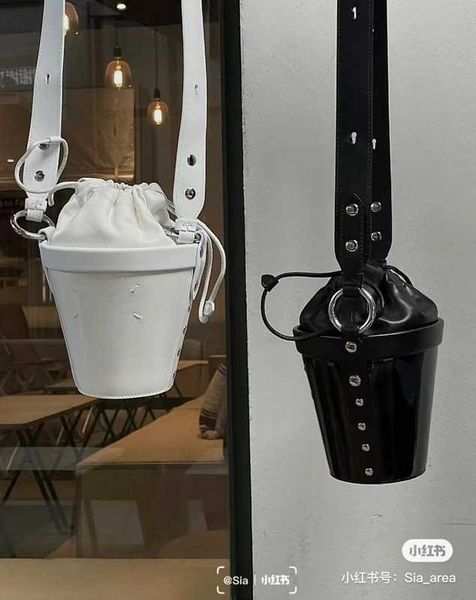 margiela majira niche catwalk style irregular geometry one shoulder messenger hand chain bag flip chest waist bag mm6
margiela majira niche catwalk style irregular geometry one shoulder messenger hand chain bag flip chest waist bag mm6