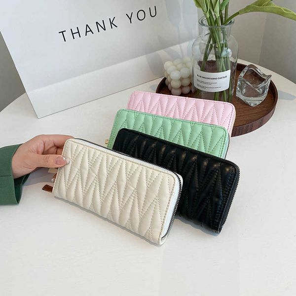 new wallet women's long embroidered thread mobile phone bag solid color women's wallet multi card bag large capacity handheld bag
new wallet women's long embroidered thread mobile phone bag solid color women's wallet multi card bag large capacity handheld bag