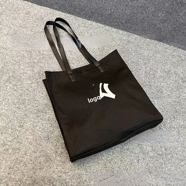 wholesale new large capacity totes black and white canvas shoulder bag versatile student handheld shopping bags
wholesale new large capacity totes black and white canvas shoulder bag versatile student handheld shopping bags