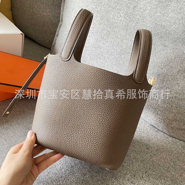 orignal luxury designer bag picotin lock handmade wax lined vegetable basket for women's bags with lychee pattern tc cowhide bucket 18c
orignal luxury designer bag picotin lock handmade wax lined vegetable basket for women's bags with lychee pattern tc cowhide bucket 18c