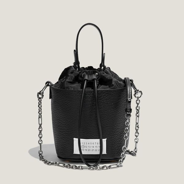 margiela ins korean style niche design leather bucket bag leather portable one shoulder messenger chain black and white classic women's
margiela ins korean style niche design leather bucket bag leather portable one shoulder messenger chain black and white classic women's