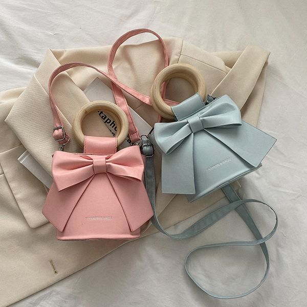 evening bags mini bucket crossbody bags for women pu leather bow tie round wooden handle bags fashion female small shoulder handbags 230714
evening bags mini bucket crossbody bags for women pu leather bow tie round wooden handle bags fashion female small shoulder handbags 230714