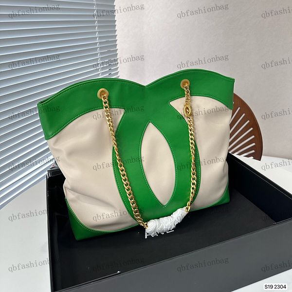 designer womens shoulder bag double color canvas bag large shopping bag gold metal chain underarm bag letter small pendant travel bag garbag
designer womens shoulder bag double color canvas bag large shopping bag gold metal chain underarm bag letter small pendant travel bag garbag