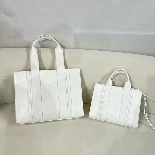 leather textured tote bag design a unique luxury high-grade high capacity daily handbag vertical leather stripes calfskin embroidery
leather textured tote bag design a unique luxury high-grade high capacity daily handbag vertical leather stripes calfskin embroidery