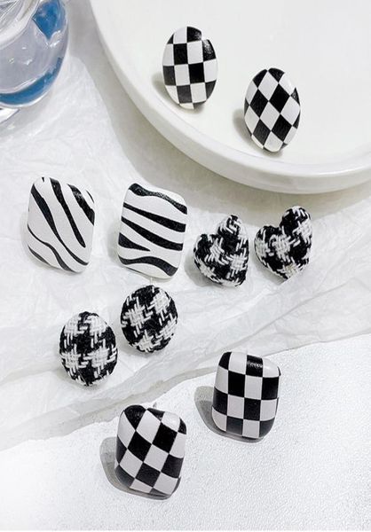 black and white chessboard grid allmatching graceful female stud earrings7819185, Golden;silver
black and white chessboard grid allmatching graceful female stud earrings7819185, Golden;silver