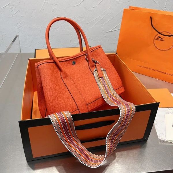 women bags classic handbags garden party gardening handbag cowhide portable messenger women's bag
women bags classic handbags garden party gardening handbag cowhide portable messenger women's bag