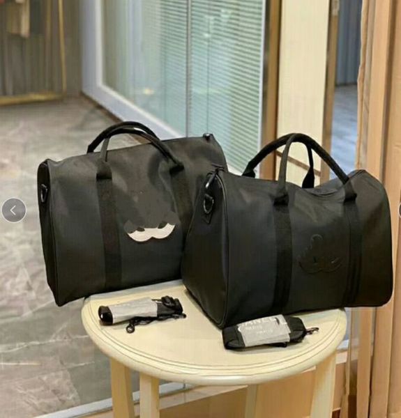 luxury fashion men women high-quality travel duffle bags brand designer luggage handbags large capacity sport bag
luxury fashion men women high-quality travel duffle bags brand designer luggage handbags large capacity sport bag