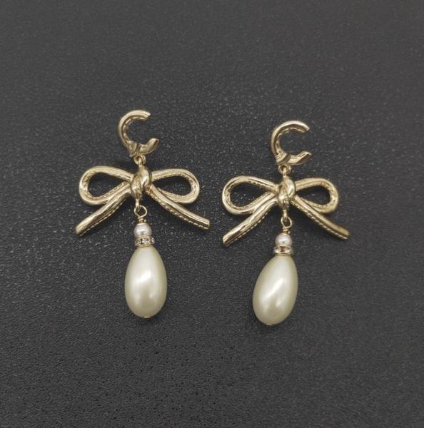 2022 charm drop earring with nature shell beads knot design in 18k gold plated for women wedding jewelry gift have box8110624, Golden
2022 charm drop earring with nature shell beads knot design in 18k gold plated for women wedding jewelry gift have box8110624, Golden