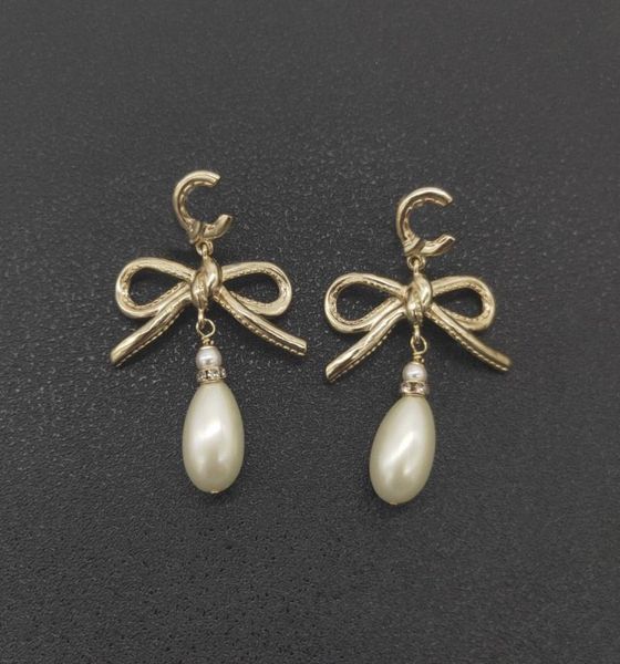 2022 charm drop earring with nature shell beads knot design in 18k gold plated for women wedding jewelry gift have box7226868, Golden
2022 charm drop earring with nature shell beads knot design in 18k gold plated for women wedding jewelry gift have box7226868, Golden