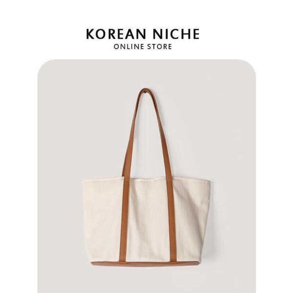 casual large capacity bag for women in niche and versatile vertical pattern patchwork canvas simple tote bag for students
casual large capacity bag for women in niche and versatile vertical pattern patchwork canvas simple tote bag for students