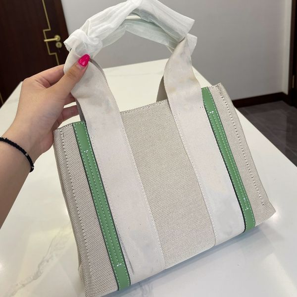 5a brand designer bag women's fashion canvas shopping bag stripe decoration woody tote bag fashion large capacity beach bag commuter ba
5a brand designer bag women's fashion canvas shopping bag stripe decoration woody tote bag fashion large capacity beach bag commuter ba
