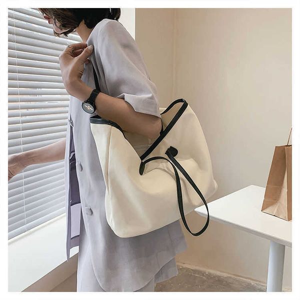 women's bag new canvas high capacity tote versatile commuter advanced simple student solid one shoulder handheld
women's bag new canvas high capacity tote versatile commuter advanced simple student solid one shoulder handheld