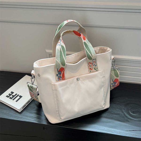 new fashion waterproof wide shoulder strap commuter bag student classroom bag large capacity mommy bag canvas tote bag
new fashion waterproof wide shoulder strap commuter bag student classroom bag large capacity mommy bag canvas tote bag