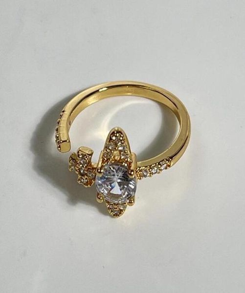 west queen saturn ring wood star vivi new niche zircon geometric diamond set planet metal wind opening adjustable 1 1 ring women 6214030, Silver
west queen saturn ring wood star vivi new niche zircon geometric diamond set planet metal wind opening adjustable 1 1 ring women 6214030, Silver