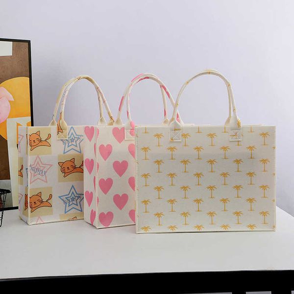 new colored printed handbag felt bag tote bag simple and fashionable commuting bag large capacity gift bag
new colored printed handbag felt bag tote bag simple and fashionable commuting bag large capacity gift bag