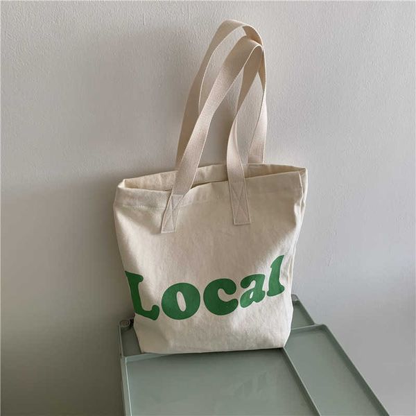 new version canvas shoulder bag for female students letter printed small fresh shopping bag practical tote bag
new version canvas shoulder bag for female students letter printed small fresh shopping bag practical tote bag