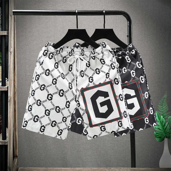 striped shorts men's outer shorts summer thin quick drying beach pants men's loose large casual pants, White;black
striped shorts men's outer shorts summer thin quick drying beach pants men's loose large casual pants, White;black