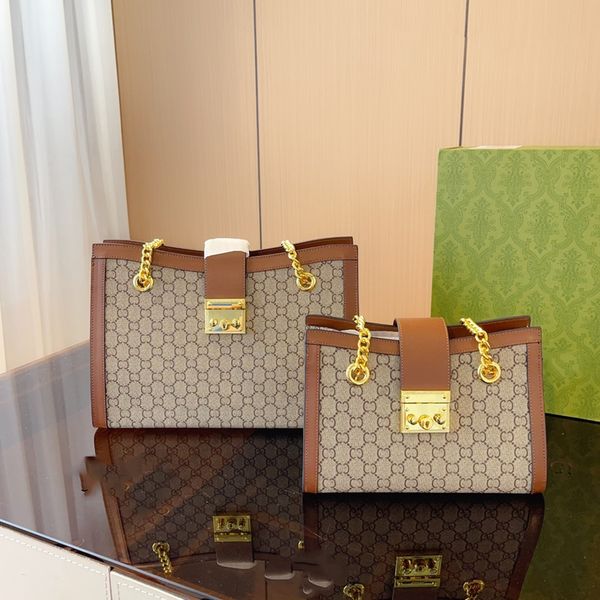 designers padlock large tote chain bag woman leather shopping bag adjustable strap underarm package the single shoulder bag
designers padlock large tote chain bag woman leather shopping bag adjustable strap underarm package the single shoulder bag